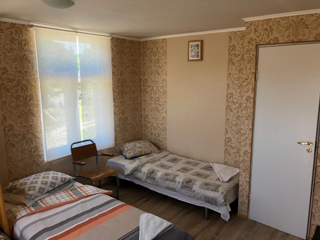Двухместный (Двухместный номер с 2 отдельными кроватями) гостевого дома Viesu Nams Jūras sapņi, Дундага