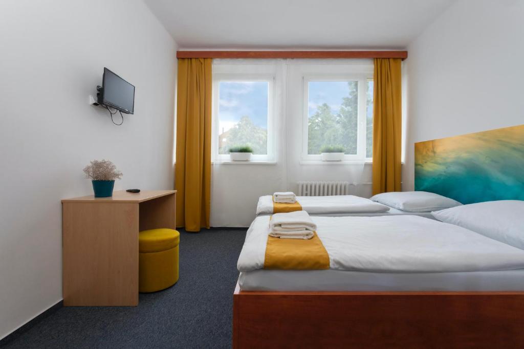 Двухместный (Стандартный двухместный номер с 1 кроватью или 2 отдельными кроватями) отеля Atlas Hotel Garni, Прага
