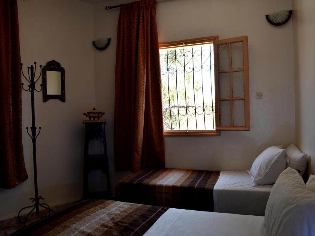 Двухместный (Двухместный номер с 1 кроватью или 2 отдельными кроватями и собственной ванной комнатой) гостевого дома Dar Yasser, Марракеш