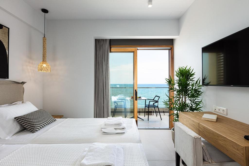 Студио (Улучшенный номер-студио с видом на море) отеля North Coast Seaside Suites, Ретимно, Крит
