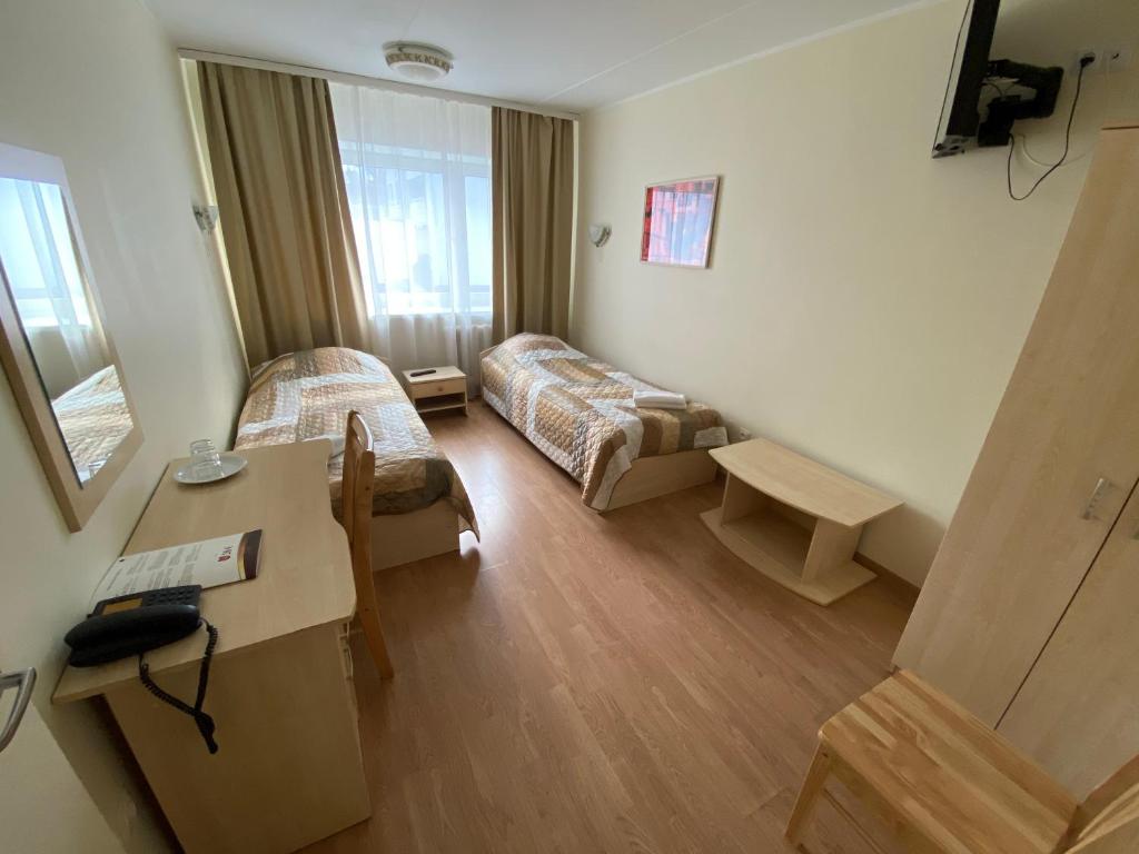 Двухместный (Двухместный номер с 2 отдельными кроватями и общей ванной комнатой) отеля Dorell, Таллин