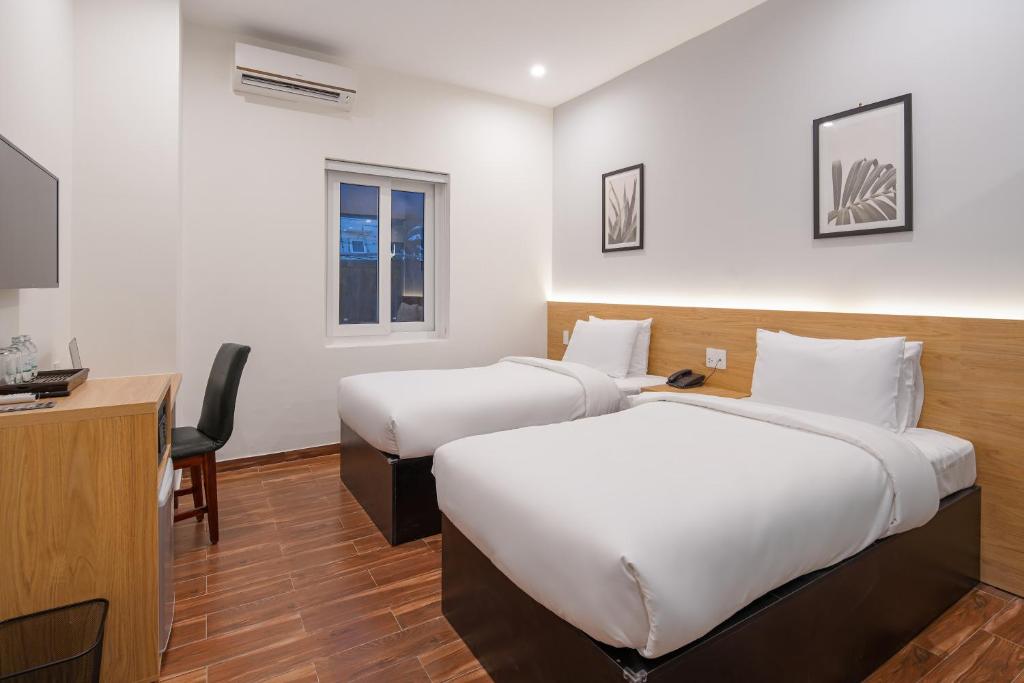Двухместный (Стандартный двухместный номер с 2 отдельными кроватями) отеля Chill Suites Nha Trang, Нячанг
