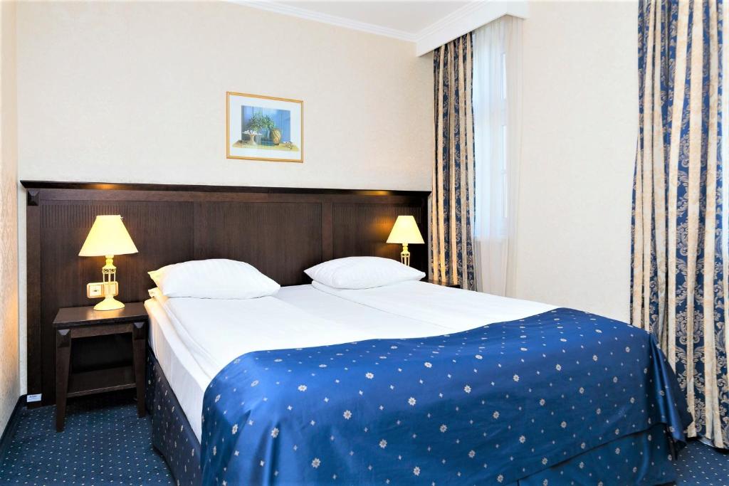 Двухместный (Небольшой двухместный номер с 1 кроватью или 2 отдельными кроватями) отеля Rixwell Gertrude Hotel, Рига