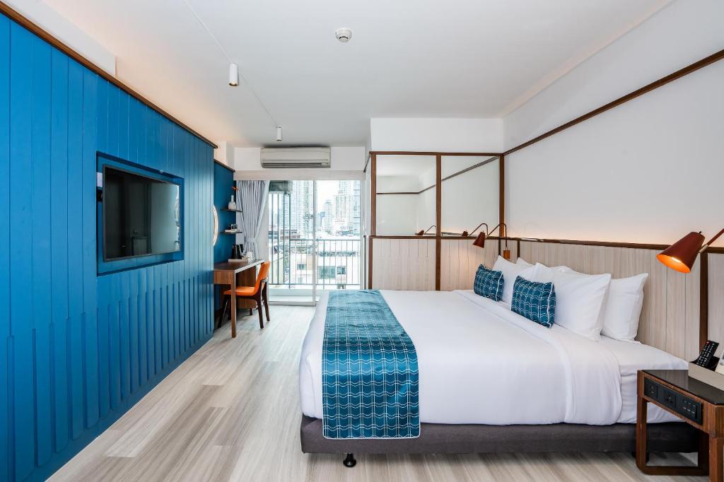 Двухместный (Двухместный номер Делюкс с 1 кроватью или 2 отдельными кроватями, вид на город) отеля At Mind Executive Suites, Бангкок