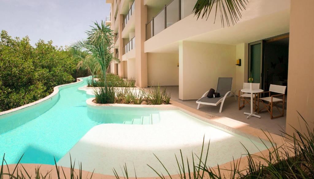Сьюит (Полулюкс с выходом к воде) курортного отеля Dreams Natura Resort & Spa - All Inclusive, Пуэрто-Морелос