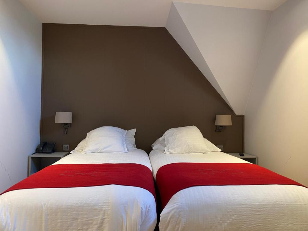 Двухместный (Бюджетный двухместный номер с 2 отдельными кроватями) отеля Hotel New Regina, Ипр