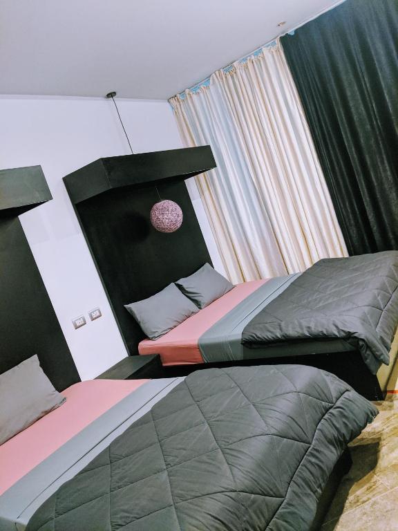 Двухместный (Двухместный номер Делюкс с 1 кроватью или 2 отдельными кроватями, вид на город) хостела Marina Square Hostel, Хургада