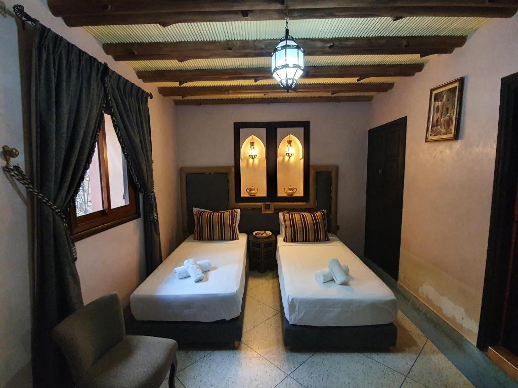 Двухместный (Двухместный номер с 1 кроватью или 2 отдельными кроватями) отеля Dar Assarou, Имлиль