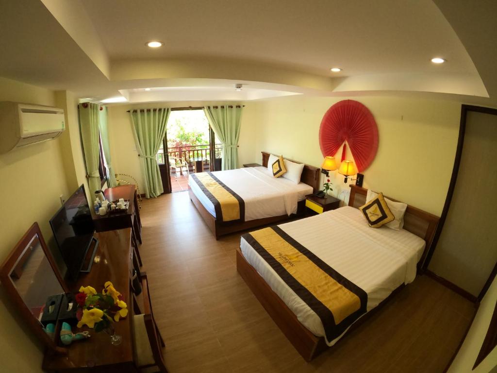 Двухместный (Двухместный номер с 1 кроватью или 2 отдельными кроватями и видом на бассейн) курортного отеля Vela Phu Quoc Resort, Дуонг-Донг