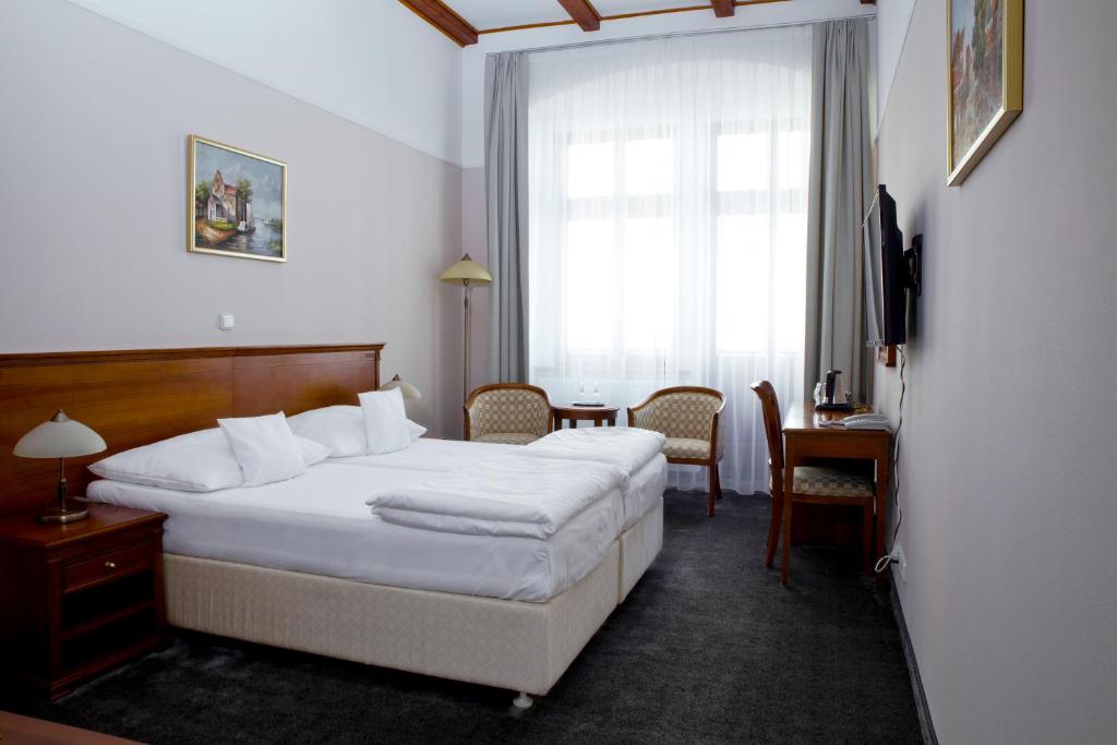 Двухместный (Улучшенный двухместный номер с 1 кроватью или 2 отдельными кроватями) отеля Wellness Hotel Ida, Франтишковы-Лазне