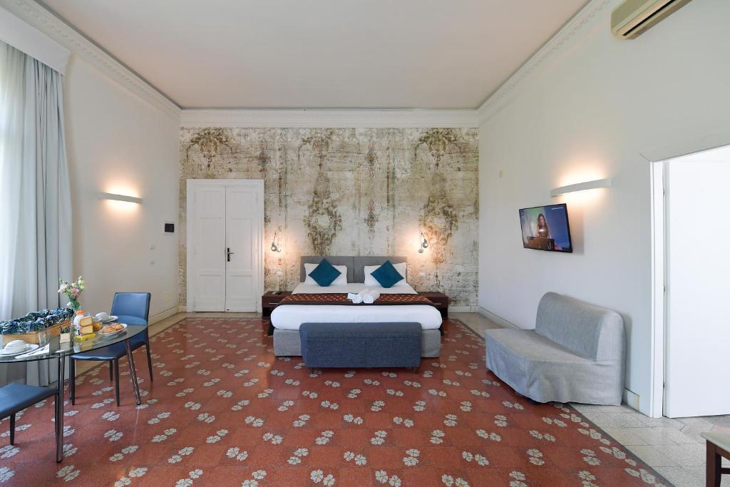 Сьюит (Просторный полулюкс) отеля Suites Farnese Design, Рим