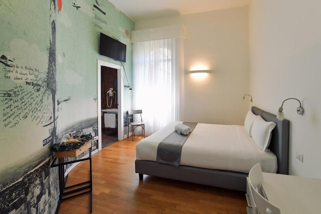 Двухместный (Улучшенный двухместный номер с 1 кроватью или 2 отдельными кроватями) отеля Suites Farnese Design, Рим