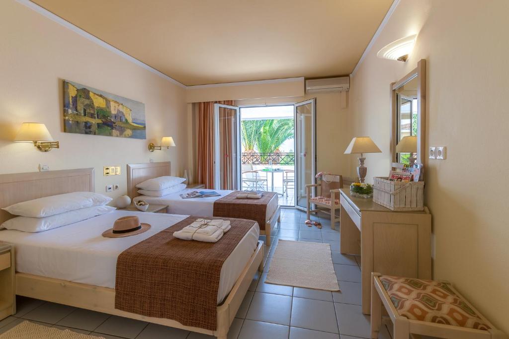 Двухместный (Стандартный двухместный номер с 2 отдельными кроватями и видом на сад) отеля Dedalos Hotel, Малиа