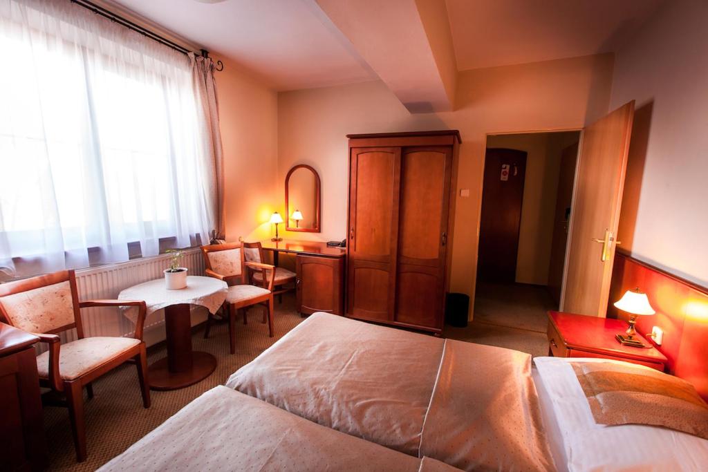 Двухместный (Стандартный двухместный номер с 1 кроватью или 2 отдельными кроватями) отеля Park Hotel Tartuf, Нитра