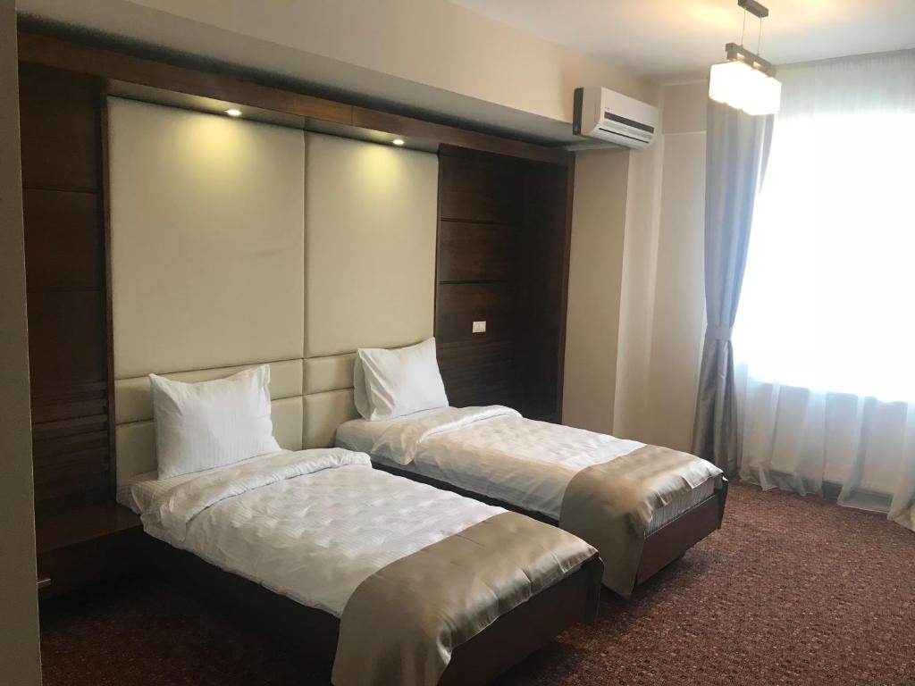 Двухместный (Представительский двухместный номер с 2 отдельными кроватями) отеля Hotel Best, Плоешти