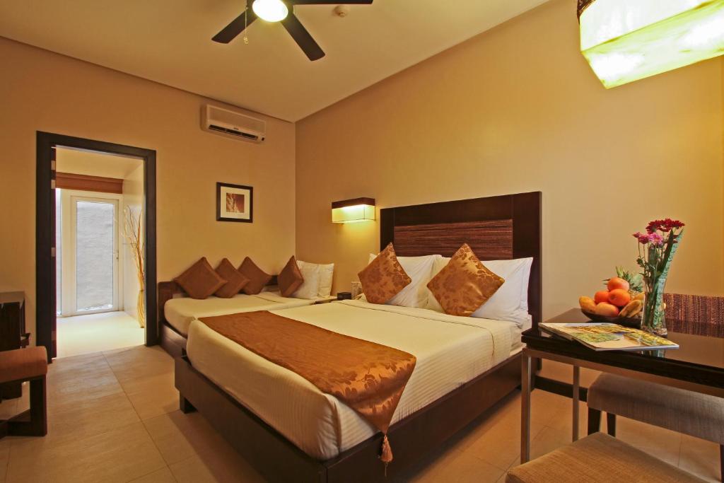 Двухместный (Номер Делюкс с кроватью размера «queen-size») курортного отеля Two Seasons Boracay Resort, Боракай