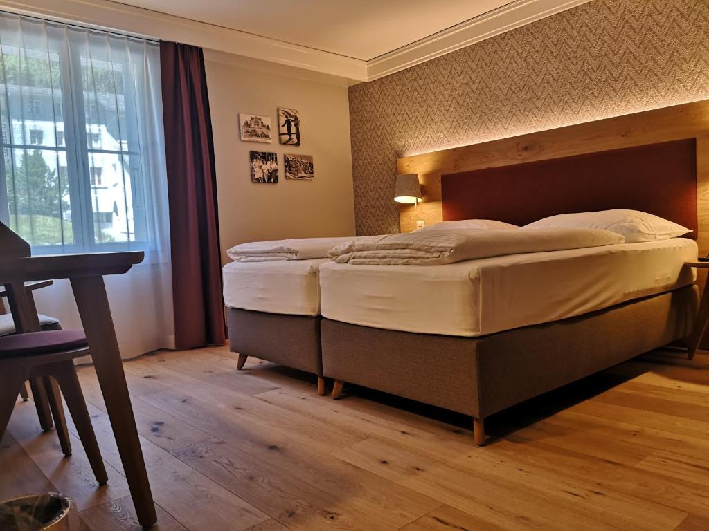 Двухместный (Двухместный номер Делюкс с 2 отдельными кроватями и видом на сад) отеля Parkhotel Schoenegg, Гриндельвальд