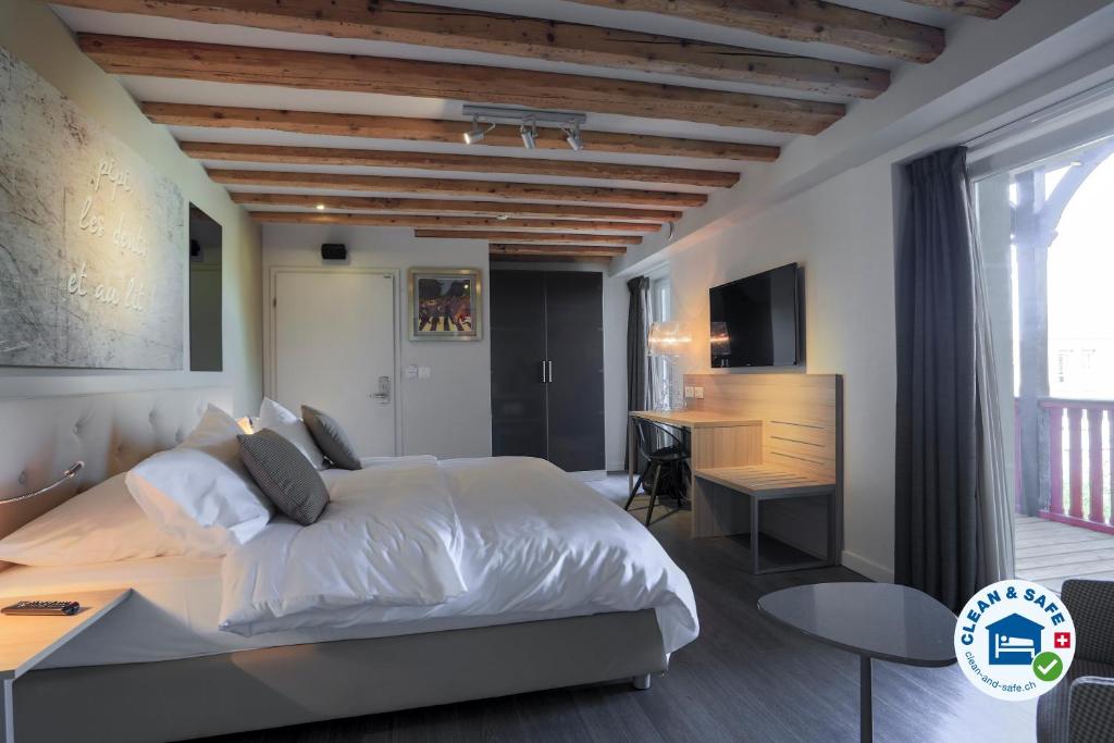 Двухместный (Улучшенный двухместный номер с 1 кроватью) отеля Chez Maman Hotel & Restaurant, Женева