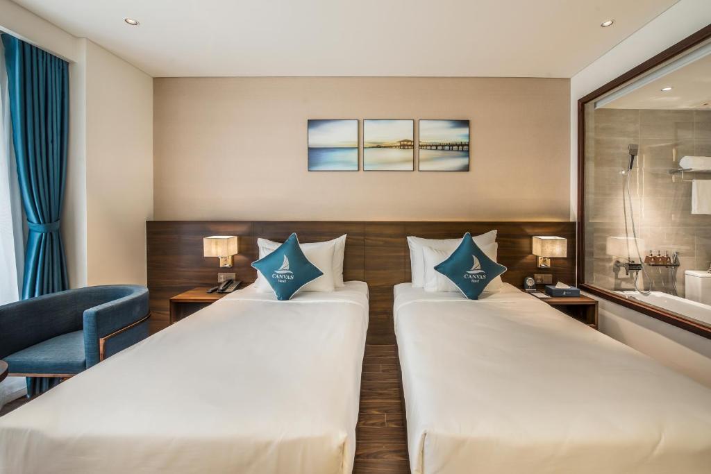 Двухместный (Grand Premier Twin Room with Partial Sea View), Canvas Danang Beach Hotel