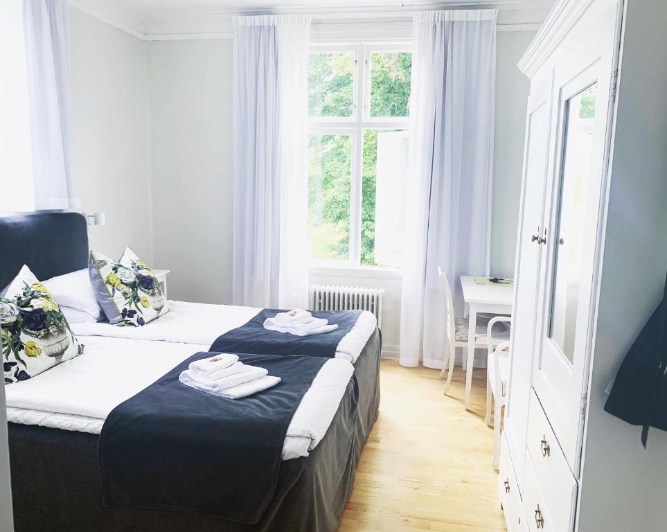 Двухместный (Стандартный двухместный номер с 1 кроватью или 2 отдельными кроватями) отеля Drottning Victorias Hotell & Vilohem, Боргхольм