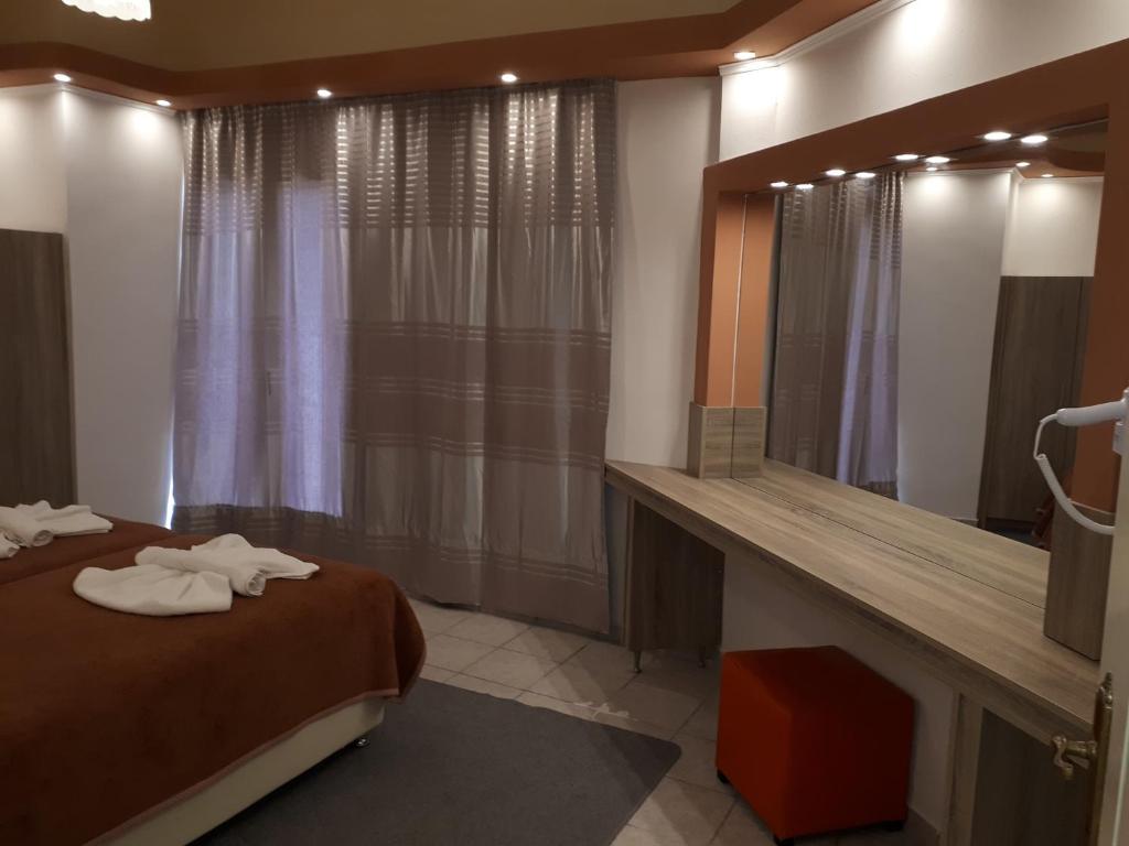 Двухместный (Улучшенный двухместный номер с 1 кроватью или 2 отдельными кроватями) отеля Hotel Marilena, Митимна