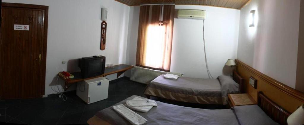 Двухместный (Двухместный номер с 2 отдельными кроватями) курортного отеля Albatros near the beach, Бухарест