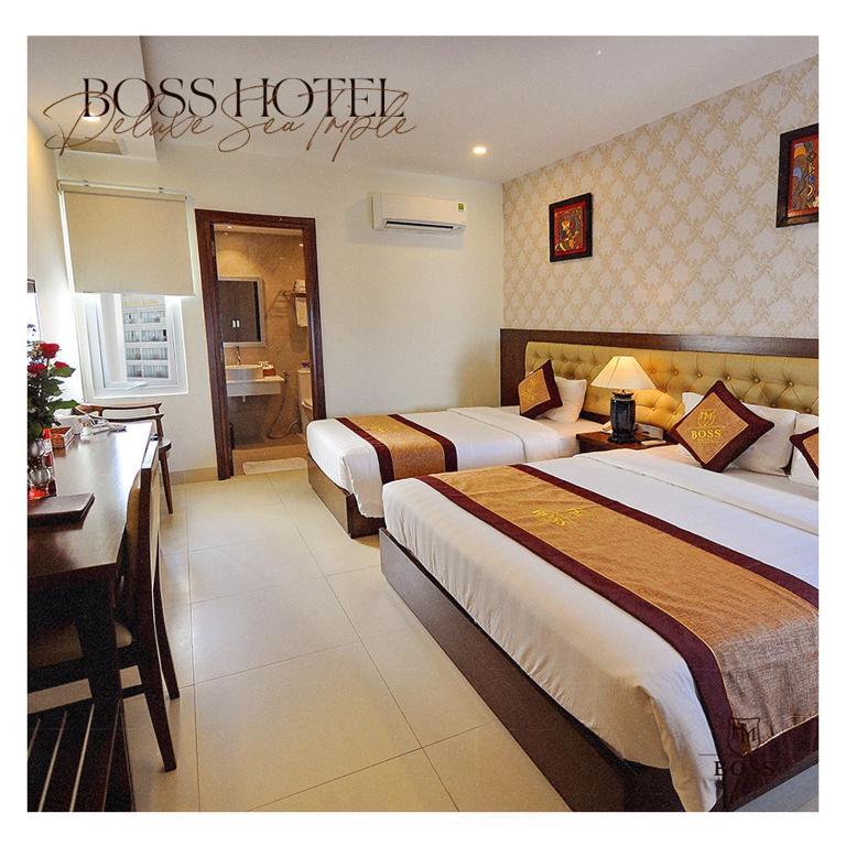 Трехместный (Трехместный номер Делюкс с частичным видом на море) отеля Boss Hotel, Нячанг