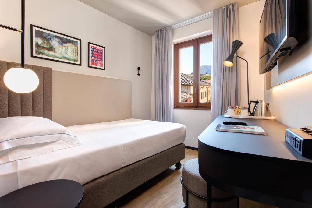 Одноместный (Номер с основными удобствами и кондиционером) отеля Lugano Dante Center Swiss Quality Hotel, Лугано