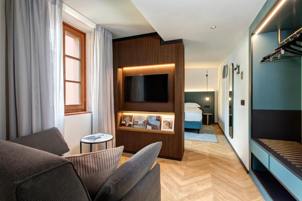 Двухместный (Двухместный номер «Премиум» с 1 кроватью или 2 отдельными кроватями и кондиционером) отеля Lugano Dante Center Swiss Quality Hotel, Лугано