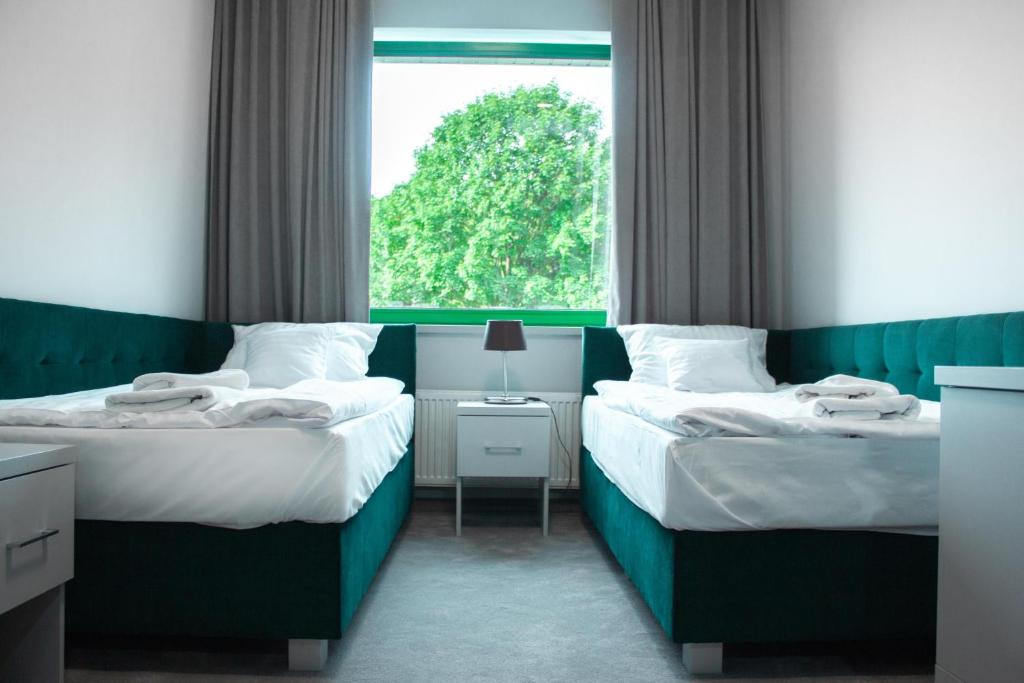 Двухместный (Улучшенный двухместный номер с 2 отдельными кроватями) отеля Hotel Promenada, Радом