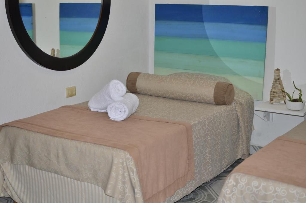 Двухместный (Бюджетный двухместный номер с 2 отдельными кроватями) отеля Hotel Nicte Ha Tulum, Тулум