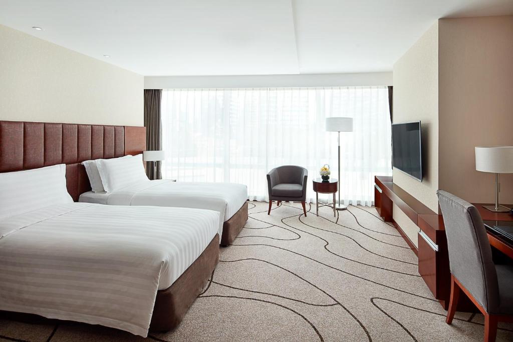 Двухместный (Улучшенный двухместный номер с 2 отдельными кроватями) отеля Pullman Shanghai Skyway, Шанхай