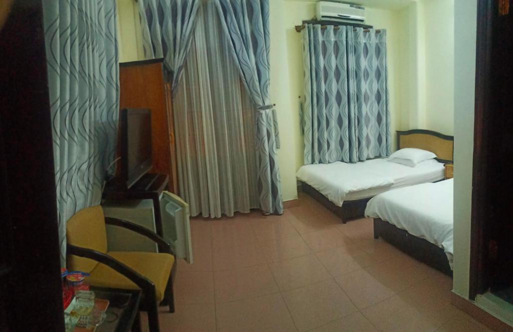 Двухместный (Двухместный номер с 2 отдельными кроватями) отеля Cat Phu Hotel, Буонметхуот