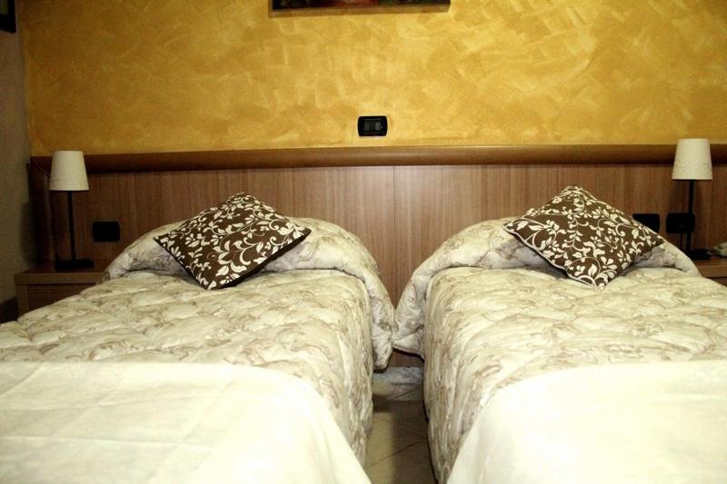Двухместный (Двухместный номер с 2 отдельными кроватями) отеля Albergo Posta, Генуя