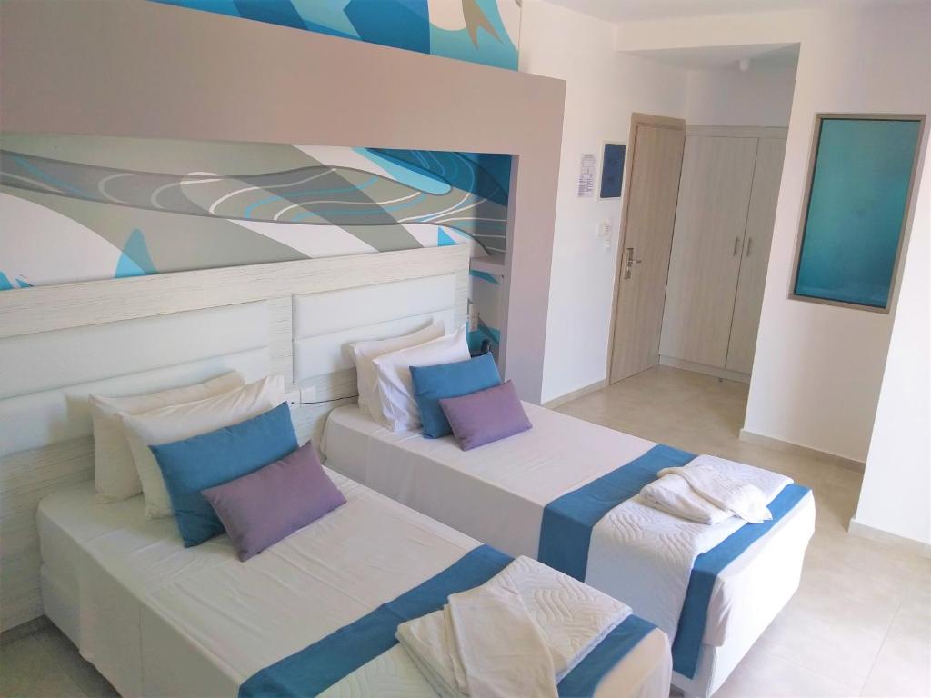 Двухместный (Улучшенный двухместный номер с 1 кроватью или 2 отдельными кроватями и видом на сад) отеля Sun Boutique Hotel (Adults Only), Амудара