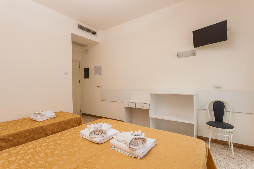 Двухместный (Двухместный номер с 1 кроватью или 2 отдельными кроватями) отеля Hotel Confort, Римини