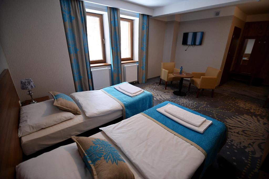 Двухместный (Большой двухместный номер с 1 кроватью) отеля Hotel EUROPA - Górnicza Strzecha, Шклярска-Поремба