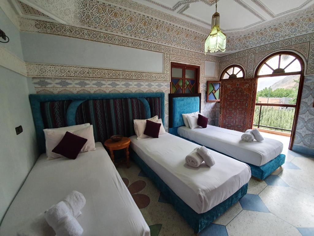 Номер (Общий номер для мужчин и женщин с 8 кроватями) отеля Dar Assarou, Имлиль