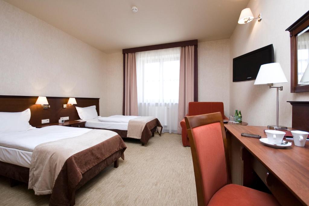 Двухместный (Двухместный номер Делюкс с 1 кроватью или 2 отдельными кроватями) отеля Hotel Korona Spa & Wellness, Люблин