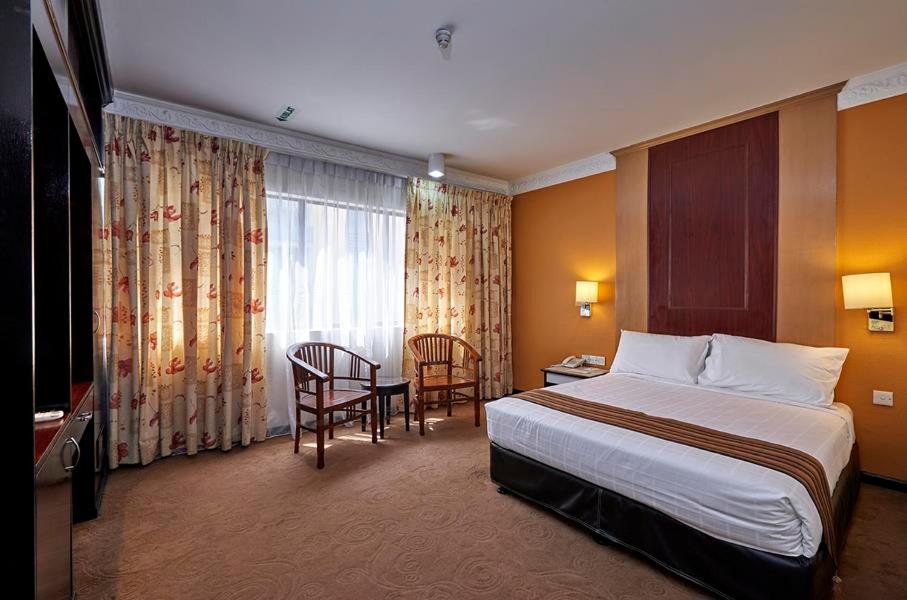 Двухместный (Улучшенный двухместный номер с 2 отдельными кроватями) отеля Palace Hotel, Куала-Лумпур