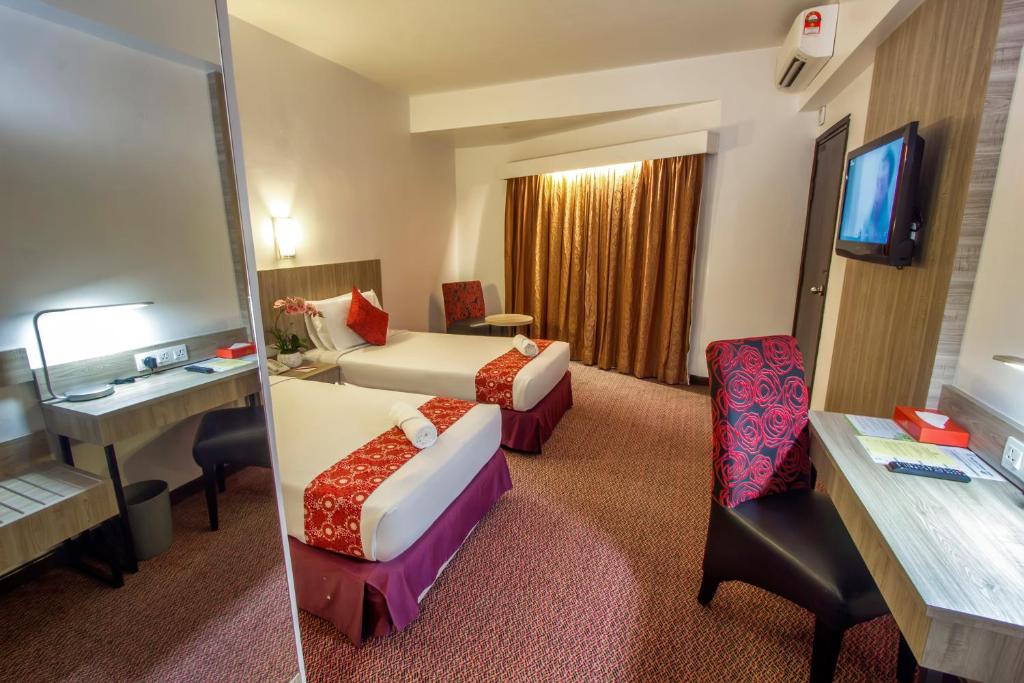 Двухместный (Двухместный номер «Премиум» с 2 отдельными кроватями - С ремонтом) отеля Hotel Grand Continental Langkawi, Лангкави