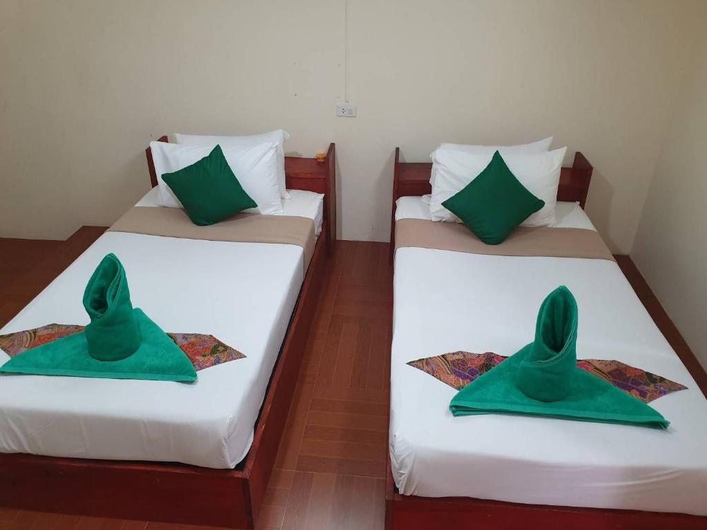 Двухместный (Двухместный номер с 2 отдельными кроватями и собственной ванной комнатой) отеля The Royal Bamboo Lodge, Сураттхани