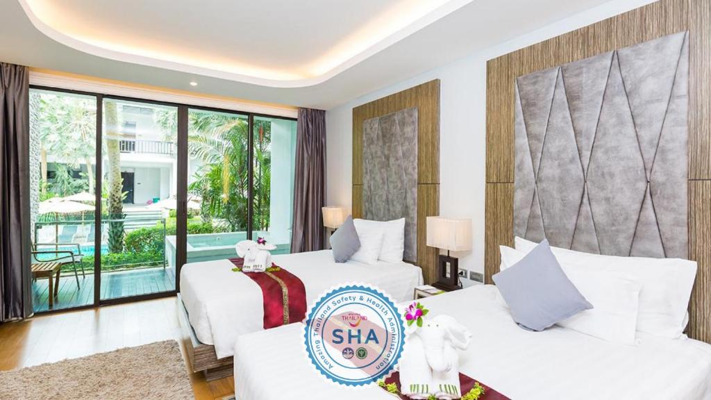 Двухместный (Двухместный номер Делюкс с 2 отдельными кроватями) отеля Wyndham Sea Pearl Resort, Phuket, Пхукет