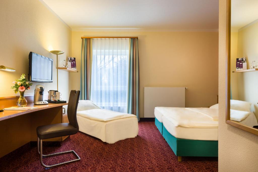 Двухместный (Стандартный номер с 1 двуспальной кроватью и 1 односпальной кроватью) отеля Mercure Hotel Ingolstadt, Ингольштадт
