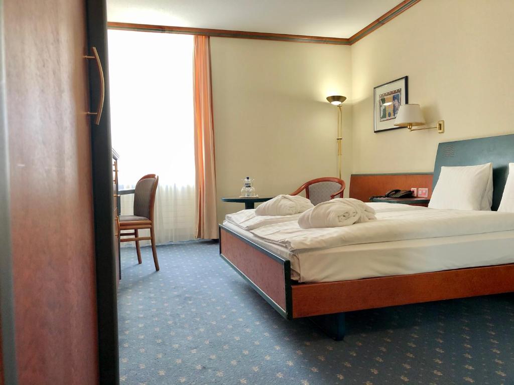 Сьюит (Улучшенный люкс «Гранд Бэйн») отеля Thermal Hotels & Walliser Alpentherme Leukerbad, Лойкербад