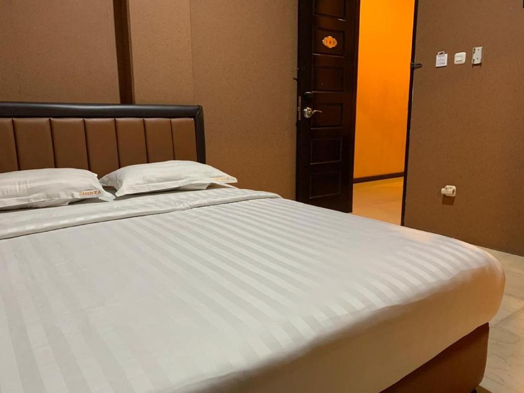 Двухместный (Двухместный номер Делюкс с 1 кроватью) отеля Rumah Shinta, Джакарта