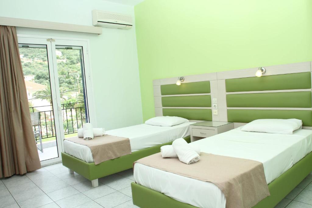 Двухместный (Двухместный номер с 1 кроватью или 2 отдельными кроватями, вид на сад) отеля Surf Hotel, Василики
