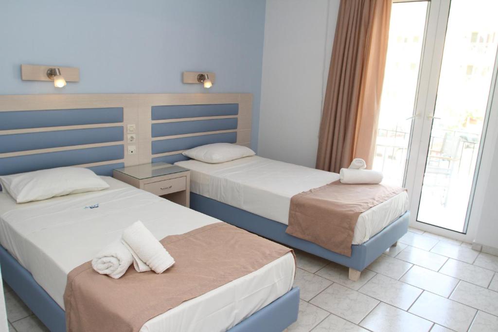 Двухместный (Двухместный номер с 1 кроватью или 2 отдельными кроватями, вид на сад) отеля Surf Hotel, Василики