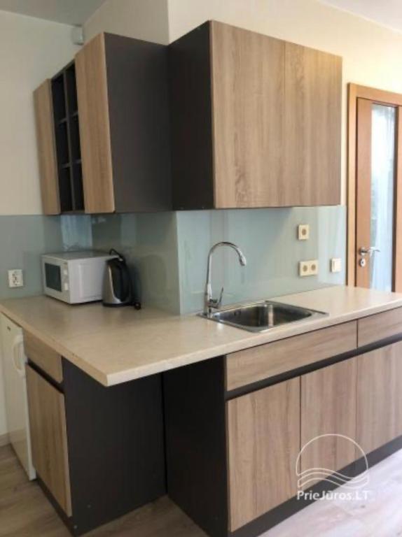 Апартаменты (Апартаменты с 2 спальнями, мини-кухней и террасой - На 1 этаже), Eurovila - Home Suite Palanga