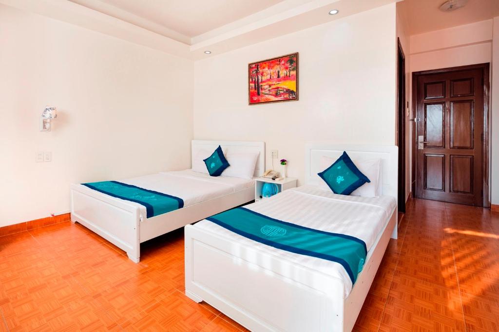 Двухместный (Двухместный номер Делюкс с 1 кроватью или 2 отдельными кроватями, вид на город) отеля Ken Nha Trang Hotel, Нячанг